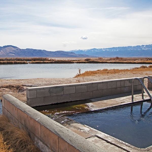 The hot springs are situated in the scenic Fish Lake Valley, with beautiful views of the surrounding mountains. 