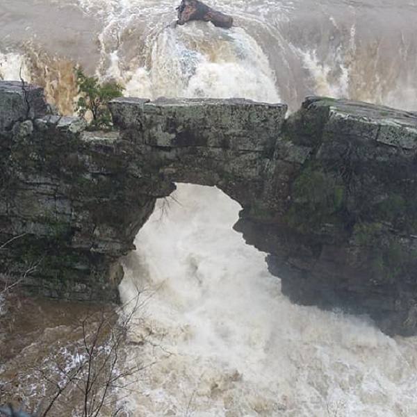 Hundreds of years of erosion have created a natural bridge with arch rock. 
