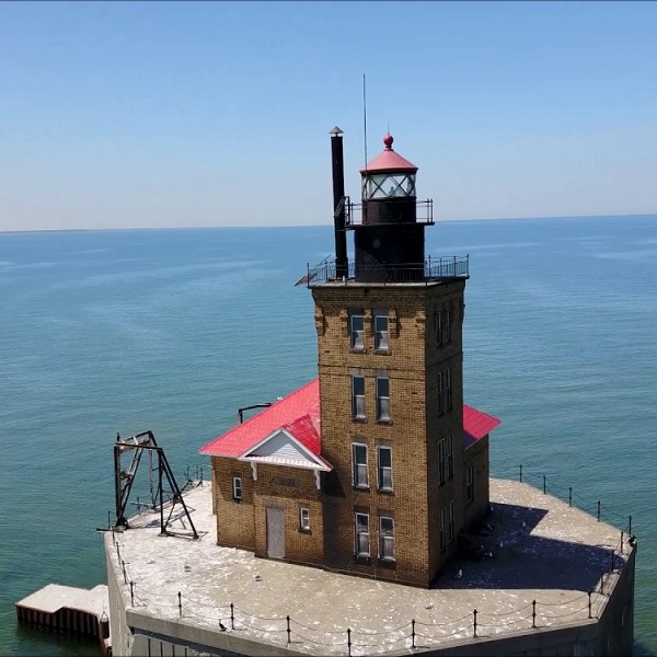 The Port Austin Lighthouse sits on the opposite end of a reef from the Point Aux Barques light.
