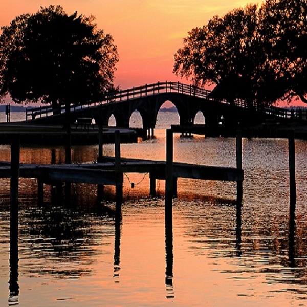 The Corolla park bridge leads to the Currituck Beach Lighthouse.
