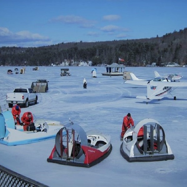 Lake Winnipesaukee in New Hampshire freezes over early to mid January. Winter activities include ice fishing and ice sailing. 
