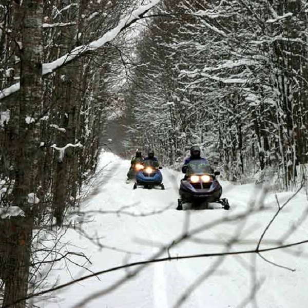 Snowmobiling is a popular winter sport on the Tugman Hill in Oneida County. 