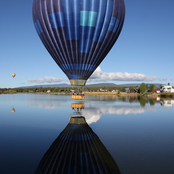 Some flights allow passengers to skim the water, or collect pine cones from the tops of trees, as the balloon floats gently by. 