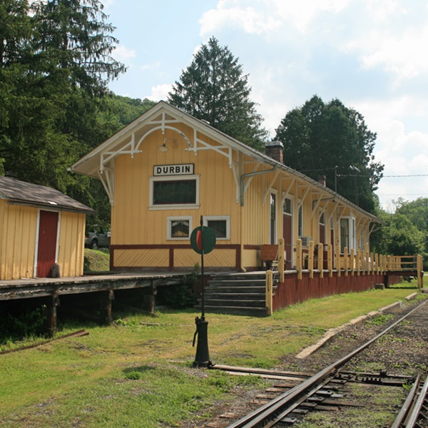 The Durbin train station, restored in the 1990s as a museum, also serves as a stop on the Durbin Rocket, a tourist train that operates during the summer months. 