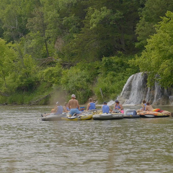 The Niobrara River carved its path through layers of sedimentary rock over millions of years, creating stunning rock formations, waterfalls, and rapids. 