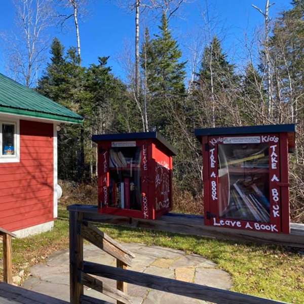 Curious George Cottage at the center is a replica of the house depicted in the books. 