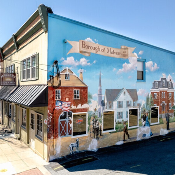 Visitors can explore Downtown Malvern's charming architecture, browse unique boutiques, and dine at local eateries offering a variety of cuisines. 