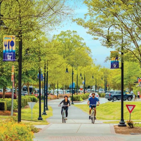 The Prisma Health Swamp Rabbit Trail is a 22-mile multi-use greenway that is perfect for walking, jogging, biking, and enjoying the scenic beauty of the area. 